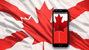 A red maple leaf phone with a Canadian flag in the background.